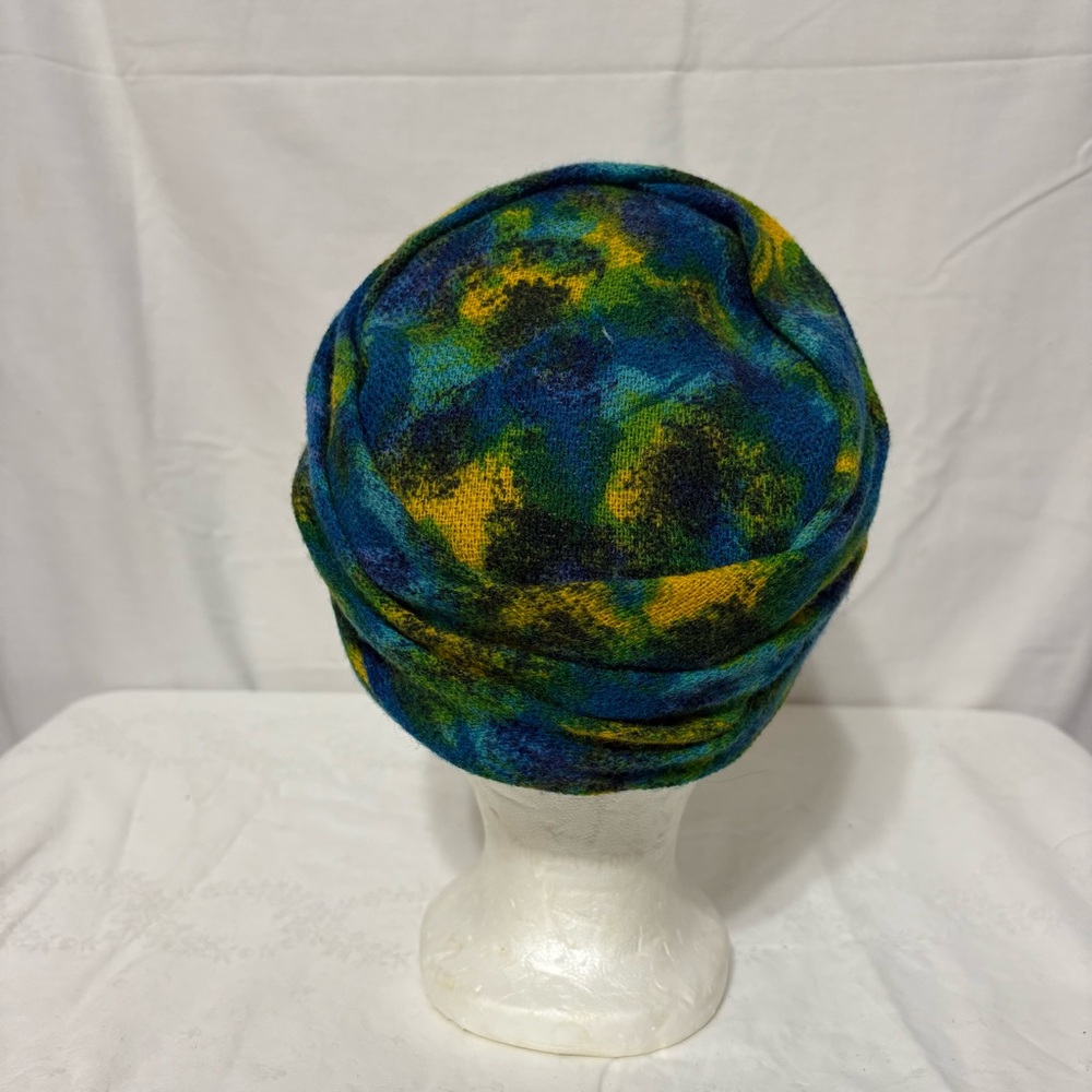 Frank M. Benson fuzzy cap hat in a multi-color design of blues and greens. - Picture 3 of 6